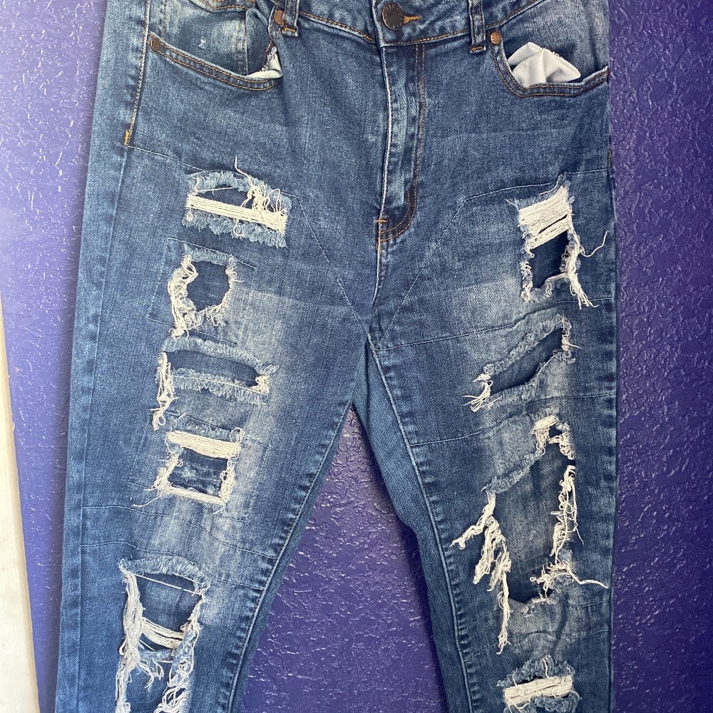 Distressed Blue Jeans